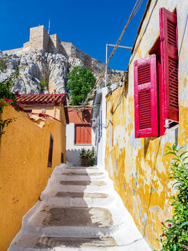 Fototapeta Colorful street in Anafiotika below Acropolis Hill 