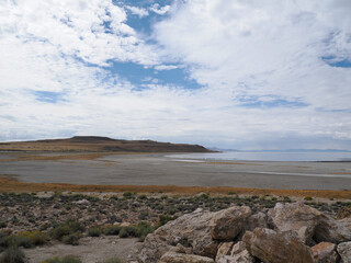 Expansive landscape view of Antelope Island hills and the Great Salt Lake shoreline