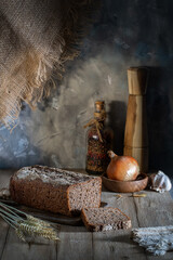 Sliced ​​homemade rye bread on a rustic table