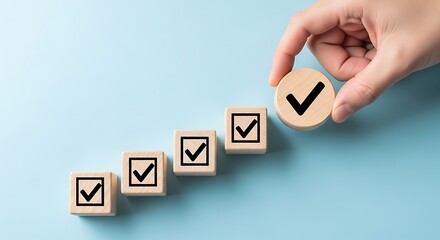 Hand placing wooden block with check mark on blue background