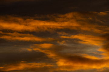 Fiery sunset cloud colour
