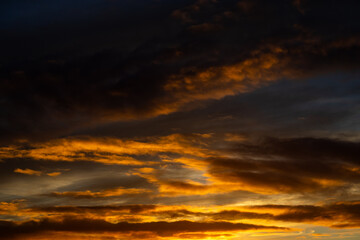 Fiery sunset cloud colour