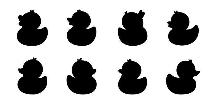 Set of black rubber duck silhouettes. Simple vector shapes for clipart, icons, and minimalist graphic projects.