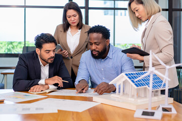 team of multiethnic colleague discuss budget performance planning, sharing idea for cost reduction, business people man woman diverse employee coworker in formal suit meeting in finance office