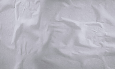 Folded white paper texture backdrop, crumpled poster surface, empty background for text or graphics