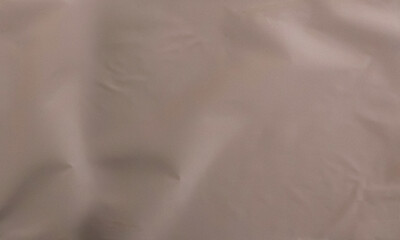 Fototapeta premium Folded white paper texture backdrop, crumpled poster surface, empty background for text or graphics