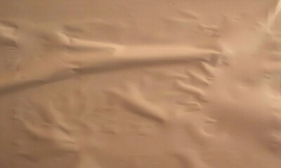 Folded white paper texture backdrop, crumpled poster surface, empty background for text or graphics