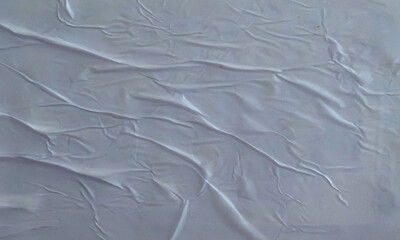 Folded white paper texture backdrop, crumpled poster surface, empty background for text or graphics
