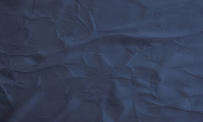 Folded white paper texture backdrop, crumpled poster surface, empty background for text or graphics