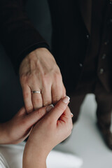  Groom places ring on bride's finger