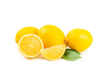 Lemon isolated on white background. Lemon fruits with a slice. Fresh lemon fruits with citrus leaves. Lemon juice. Pattern. Space for text.