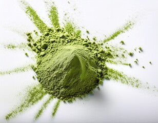 green powder scattered on white background