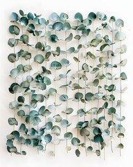 Eucalyptus leaves hanging vertically on delicate stems, creating a natural curtain effect.