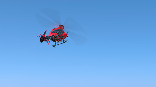 Red helicopter in blue sky