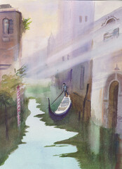 Venice canal with gondola in the early morning