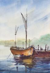 A yacht at a pier on the river