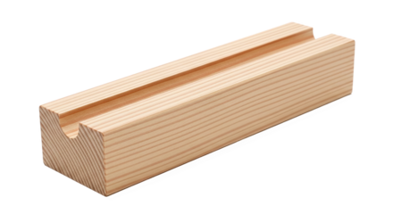 Light wooden block with a smooth groove on top—used as a stand or holder for phones, tablets, or thin boards in an organized and minimal setup