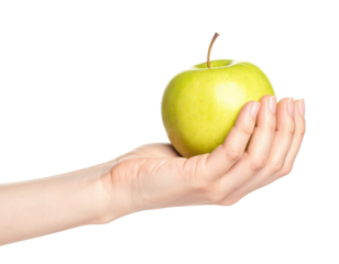 Hand holding fresh green apple isolated on transparent background