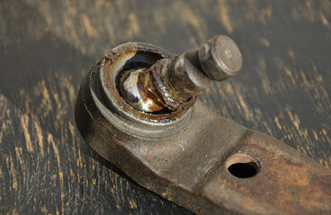 damaged car ball joint close-up. selective focus