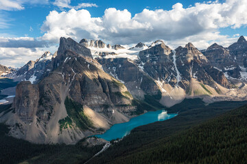Moraine Lake with snow-capped peaks in Banff National Park, Canada. Canadian tourist attractions.
