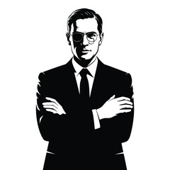 Serious businessman in suit with arms crossed in dramatic silhouette