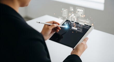 Business professional interacting with advanced digital marketing interface on tablet, utilizing stylus to manage data, optimize strategy, and enhance productivity in a modern office setting.