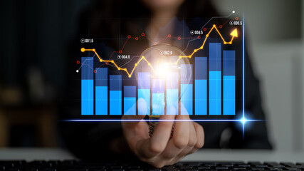 Business person presents a coin in front of advanced financial graphs, showcasing upward trends and data analysis, emphasizing investment growth opportunities and market insights. Scalp