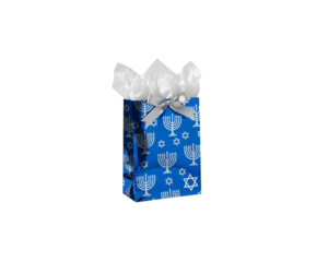 A blue gift bag with silver menorah and star of david patterns, tissue paper on transparent background, holiday present