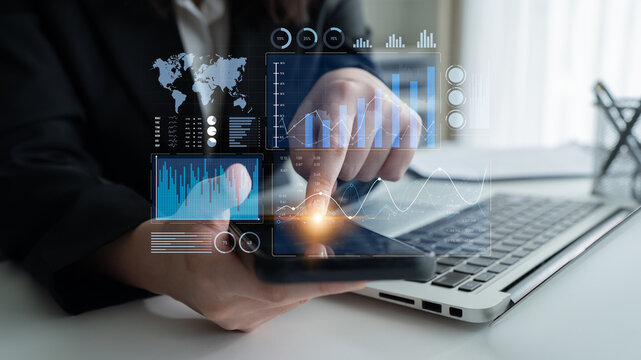 A business professional uses a digital tablet in an office setting, showcasing data visualization and analytics, emphasizing modern marketing strategies and insights. Scalp