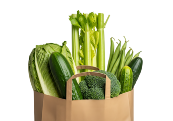 A brown paper grocery bag filled with fresh green vegetables like celery, lettuce, broccoli, and cucumbers, isolated on transparent background
