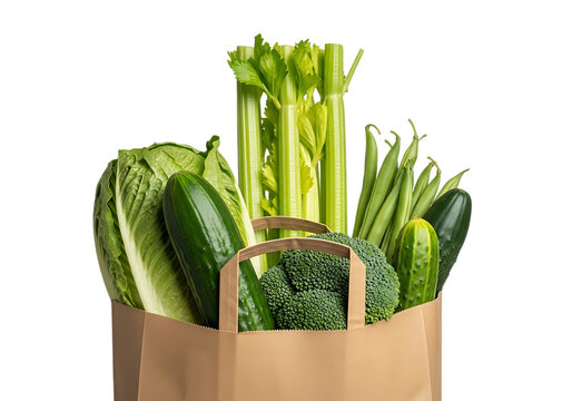 A brown paper grocery bag filled with fresh green vegetables like celery, lettuce, broccoli, and cucumbers, isolated on transparent background - Powered by Adobe