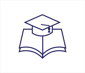  graduation hat with a tassel on an open text book representing knowledge and academic success