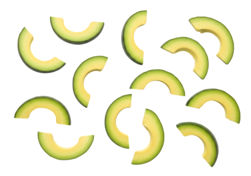 Scattered slices of fresh green avocado fruit arranged randomly on a clean transparent background, isolated on transparent background