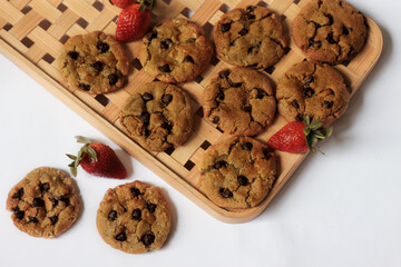It's a bunch of freshly baked chocolate chip cookies made with brown sugar.