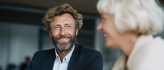 Business Partners in Discussion with Smiles and Positive Energy