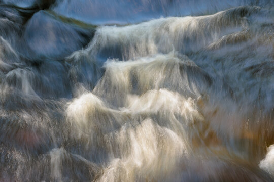 The Pike River flowing over boulders beneath the surface witihn Dave's Falls Marinette County Park, near Amberg, Wiscosnin in mid August