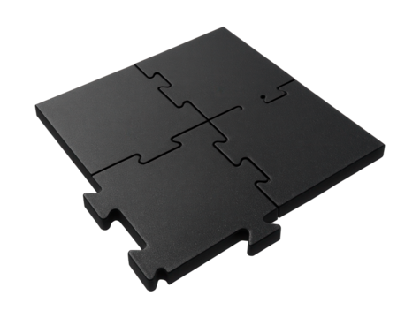 Interlocking recycled rubber pads for gym flooring and sound isolation.
