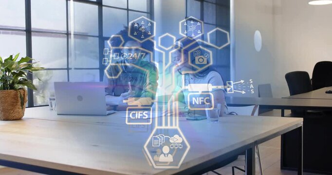 Man leaning in opening laptop, woman writing, tech hex graphics appearing, mapping CIFS NFC 24 or 7