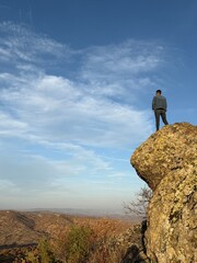 man on the top of the mountain