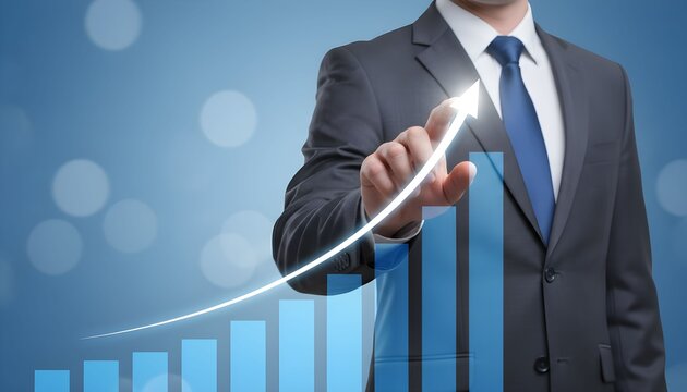 Businessman pointing at a rising bar graph, symbolizing growth and success.