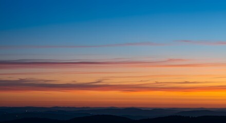 Fototapeta premium The Milky Way stretching across the night sky.