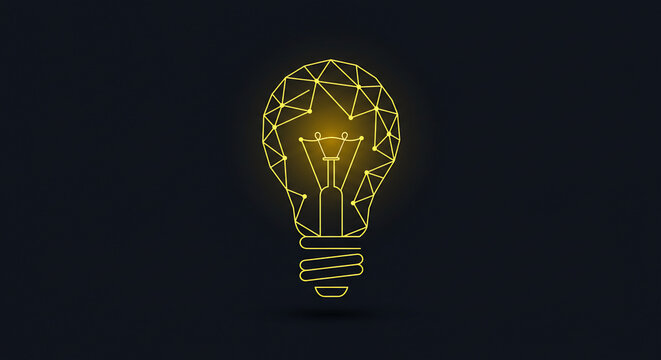 Glowing light bulb filament on dark background