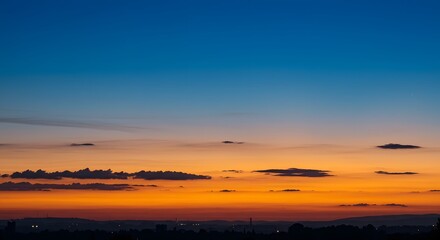 Fototapeta premium The Milky Way stretching across the night sky.