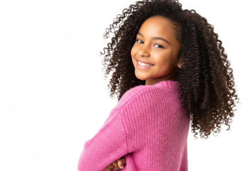 Smiling young african american girl with curly hair wearing a pink sweater with arms crossed isolated on transparent background