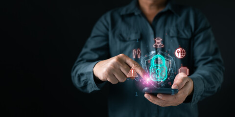 Man using smartphone with virtual padlock interface to protect personal data. Concept of cyber security, mobile privacy, network safety against hacker and digital crime defense strategy.