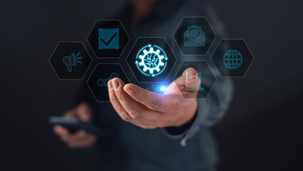 Businessman hand holding virtual gear interface to automation business workflow. Concept of digital transformation, smart technology management, and process efficiency strategy in modern corporate.
