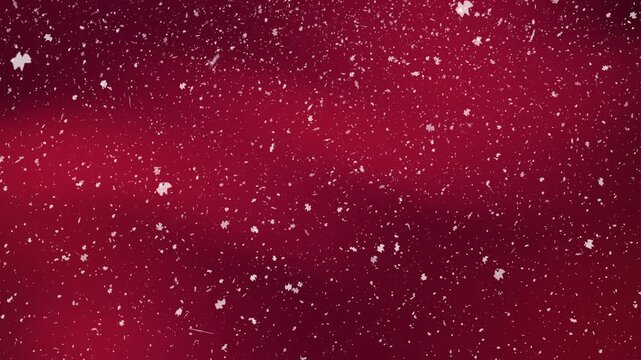 Motion background of gently falling snow in front of a festive red christmas scene. Suitable for holiday video backdrops.