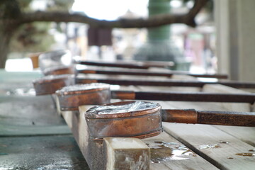 Close-Up of Water Ladles at a Shinto Shrine Chozuya