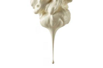 Thick white cream dripping in a long strand isolated on a transparent background