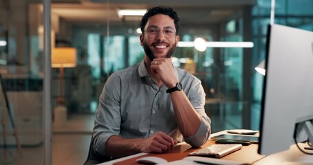 Man, typing and happy with face at startup, computer and confident with overtime at media company. Person, writer and glasses at night, portrait and editing article at creative agency in Mexico